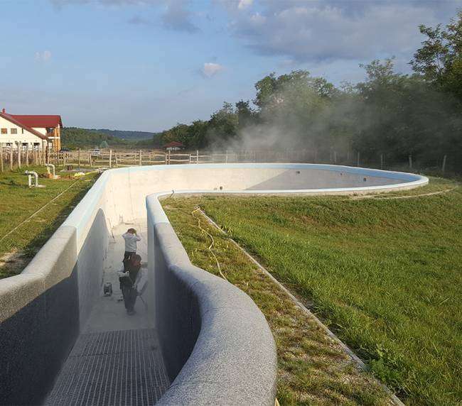 Rekonstruktion eines Löschwasser- und Pferdeschwimmbeckens